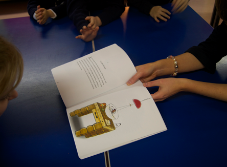 Fiona reading to school children