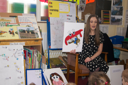 Fiona reading to school children